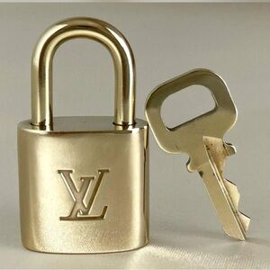Louis Vuitton Lock and Key Gold Authentic